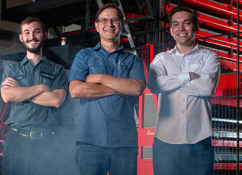 Img for link to blog post. Image has a pile of neatly stacked custom laser cut parts.